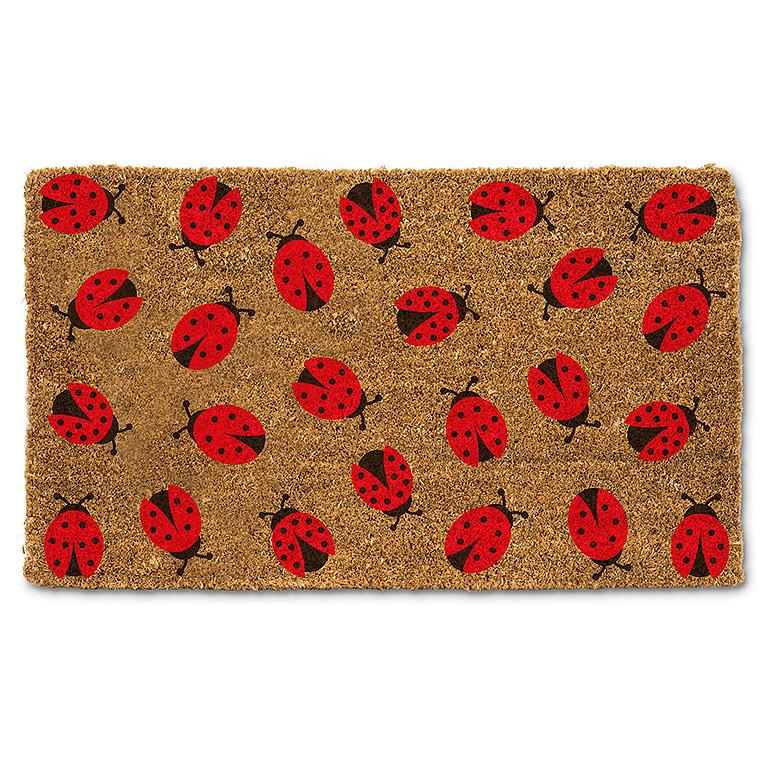 A coir doormat with ladybug patten is shown for sale on a white background.