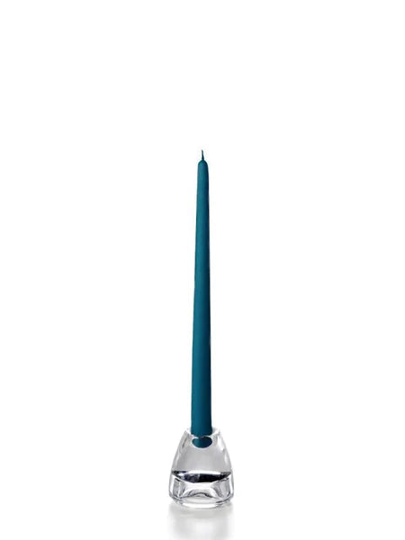 Twelve inch sapphire coloured tapper candle for sale shown on a white background on a clear candle holder. 