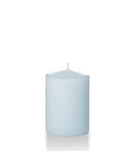 Load image into Gallery viewer, Pale blue four inch tall pillar candle shown for sale on a white background.
