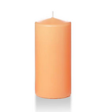 Load image into Gallery viewer, Peach coloured six inch pillar candle shown for sale on a white background.
