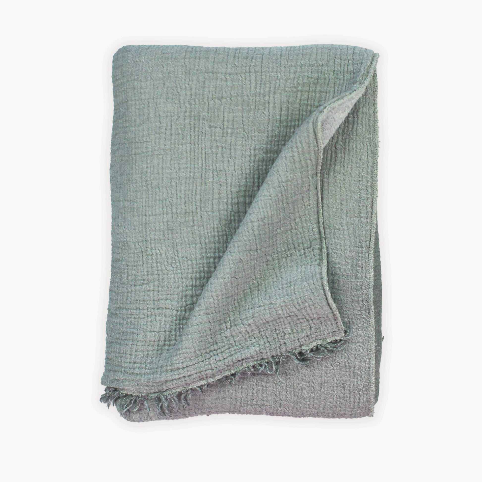 Pokoloko Turkish Fleece lined throw blanket greyPokoloko fair trade artisan made Turkish Cotton fleece lined throw Crinkle grey