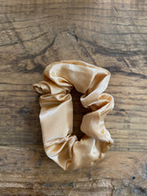 Load image into Gallery viewer, Light Gold satin scrunchy hair tie.

