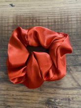 Load image into Gallery viewer, Burnt orange satin scrunchy hair tie
